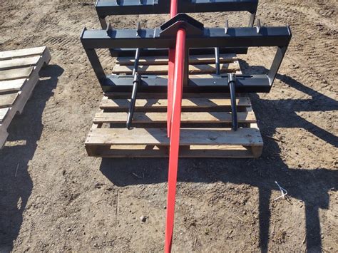 bale forks for a skid steer|skid steer round bale spear.